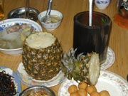 pineapple rice and chicken cooked in bamboo