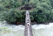 Suspension bridge for humans and horses over the Nujiang River